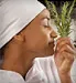woman smelling rosemary