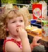 little girl eating fast food