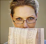 Woman with reading glasses