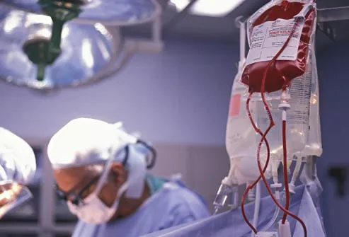 surgeon conducting blood transfusion