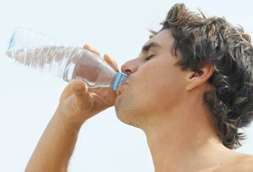getty_rf_photo_of_young_man_drinking_water.jpg