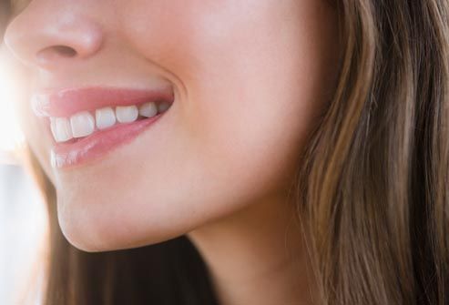 http://img.webmd.com/dtmcms/live/webmd/consumer_assets/site_images/articles/health_tools/better_smile_slideshow/getty_rm_photo_of_smiling_woman.jpg
