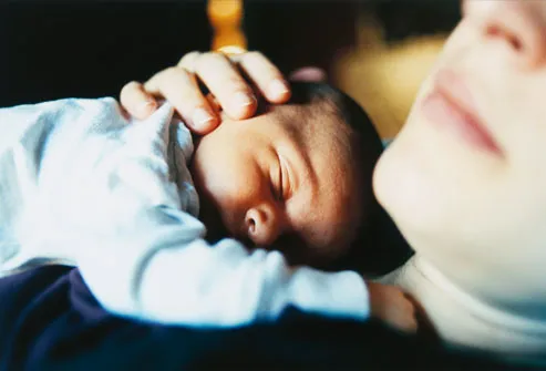Newborn Sleeping With Mother