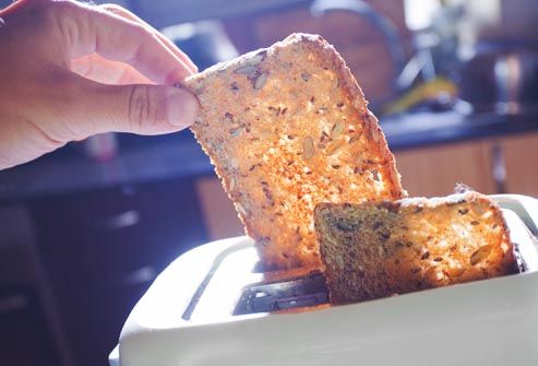 man making toast