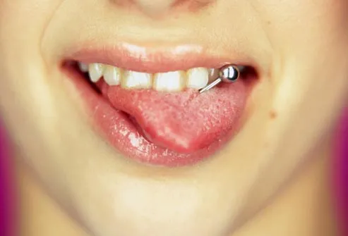 woman with tongue piercing 