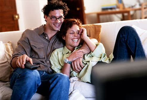 http://img.webmd.com/dtmcms/live/webmd/consumer_assets/site_images/articles/health_tools/healthy_indulgences_slideshow/getty_rr_photo_of_couple_watching_tv.jpg