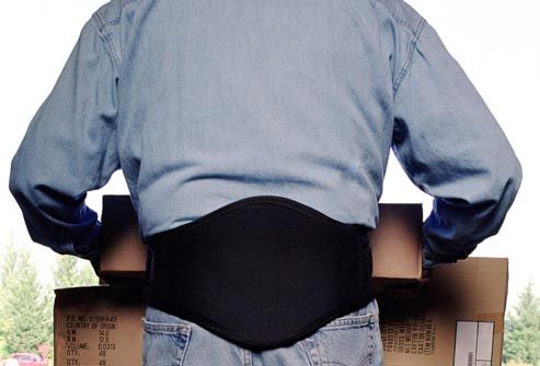 worker wearing back support belt