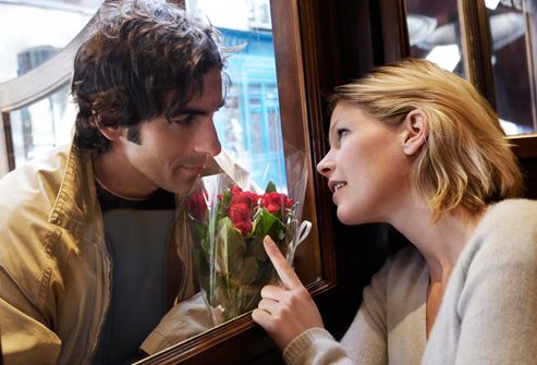 http://img.webmd.com/dtmcms/live/webmd/consumer_assets/site_images/articles/health_tools/secrets_women_wish_men_knew_slideshow/getty_rf_photo_of_man_giving_woman_flowers.jpg