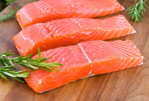 Salmon fillets with sprigs of rosemary