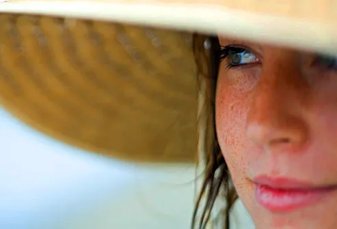 http://img.webmd.com/dtmcms/live/webmd/consumer_assets/site_images/articles/health_tools/swimming_pool_and_beach_safety_slideshow/getty_rf_photo_of_woman_in_sun_hat.jpg