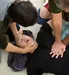 two men performing compression cpr on man
