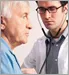 doctor checking elderly man's heart