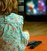 young girl watching tv