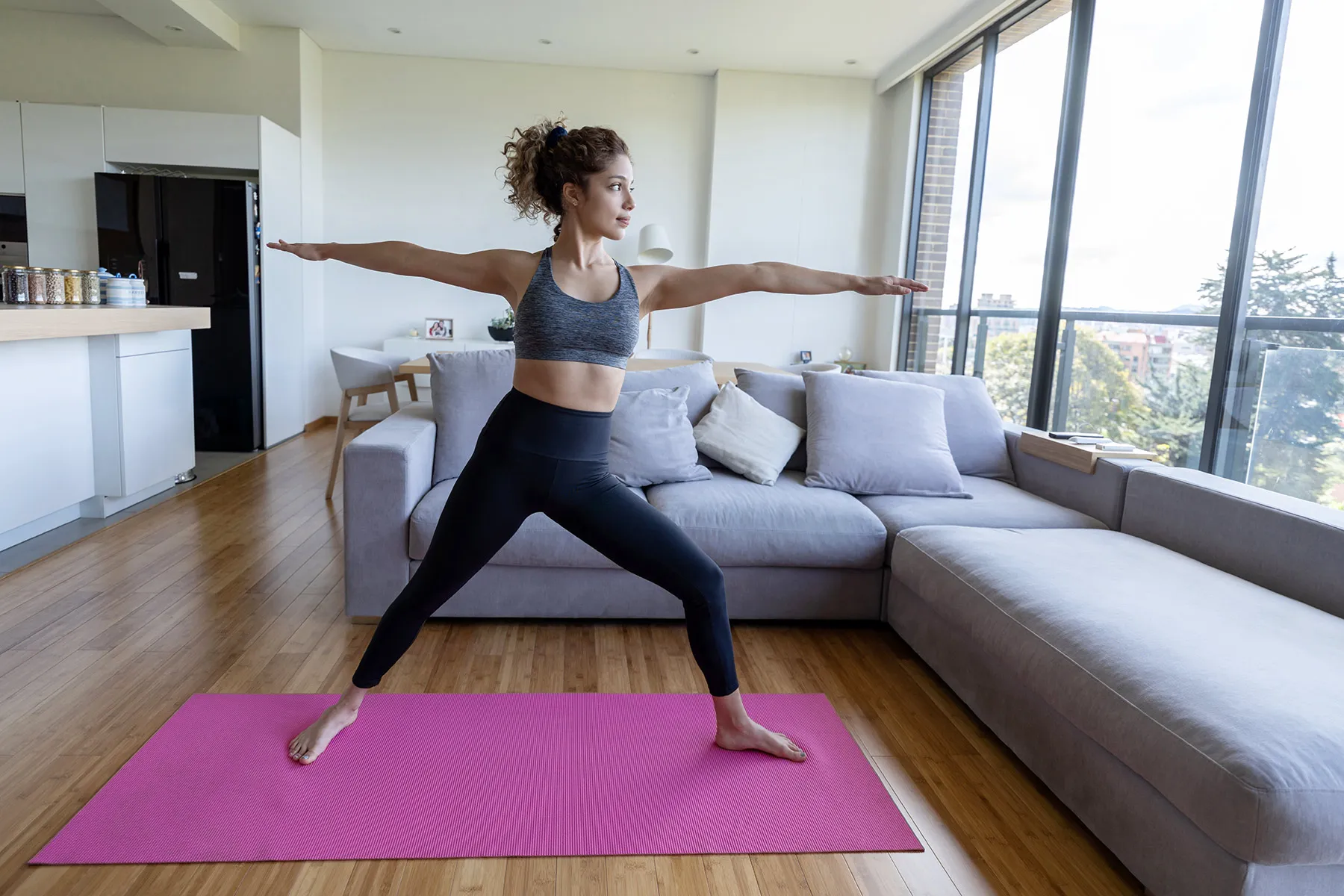 photo of woman doing yoga exercises