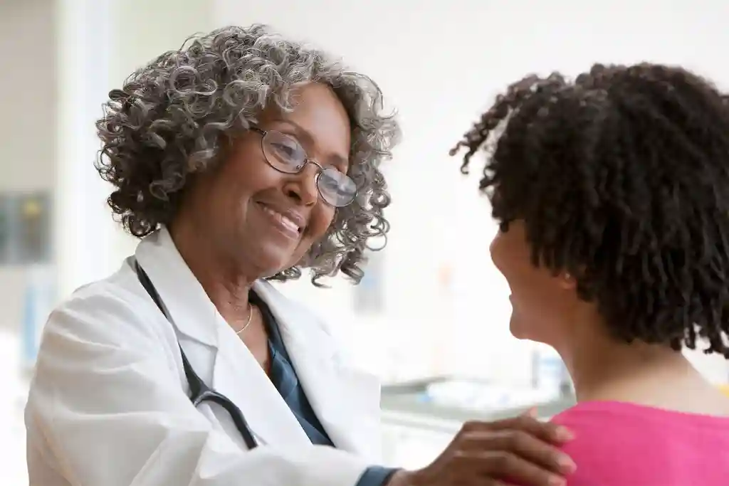 photo of doctor greeting patient