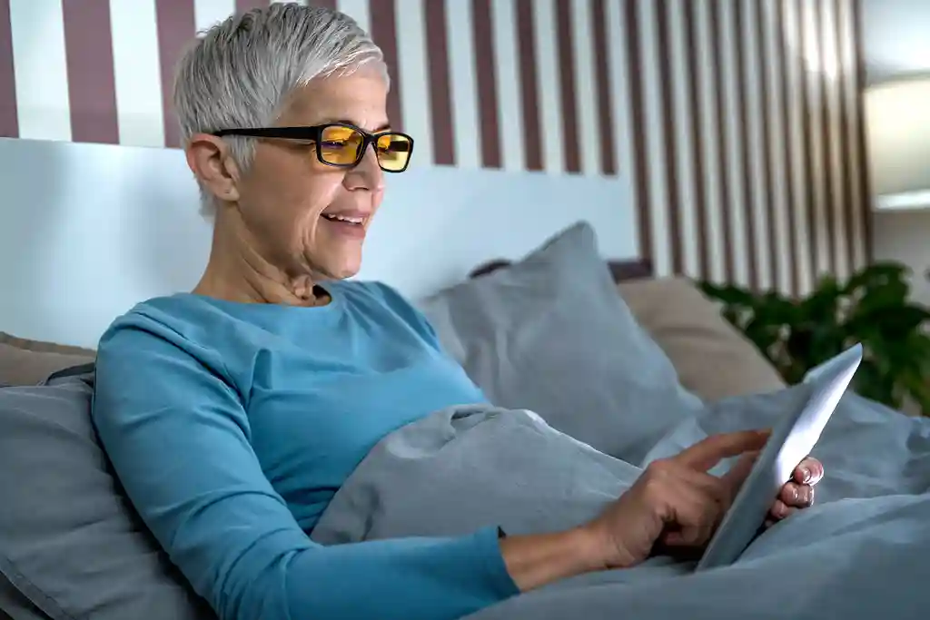 photo of mature woman wearing glasses