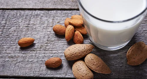 glass of milk with almonds