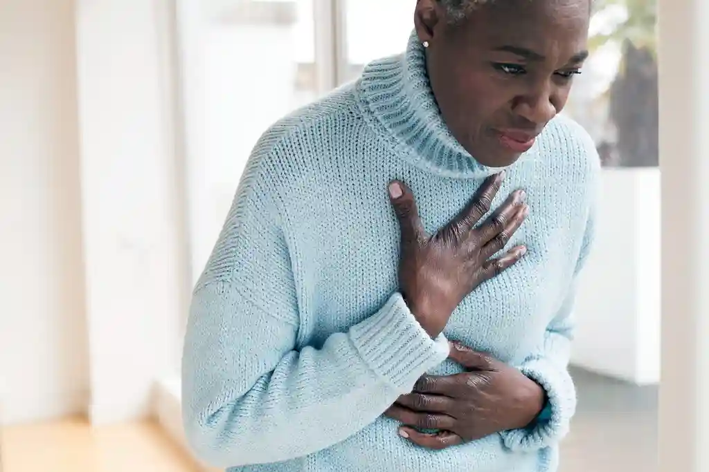 photo of mature woman with chest pain