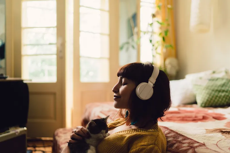 Woman listening to headphones