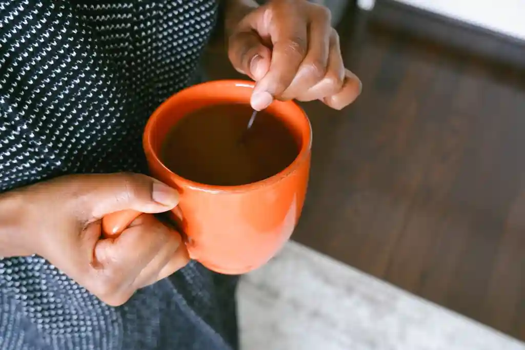 photo of woman drinking morning coffee