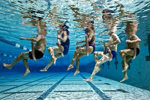 photo of five senior people in swimming pool