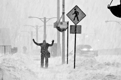 photo of man in snowstorm