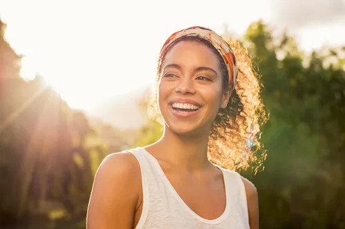 woman smiling sun