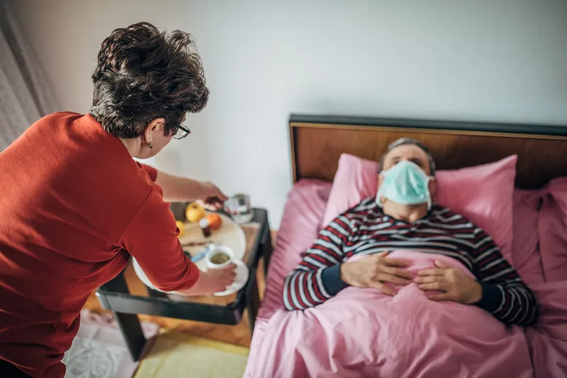 woman caring for sick husband