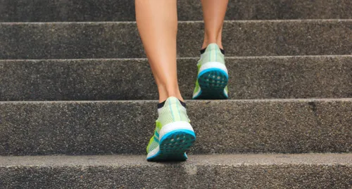 woman running on stairs