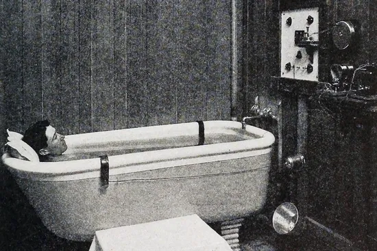 photo of man soaking in galvanic bath