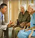 elderly couple with doctor