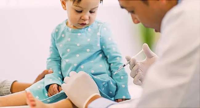 doctor vaccinating baby