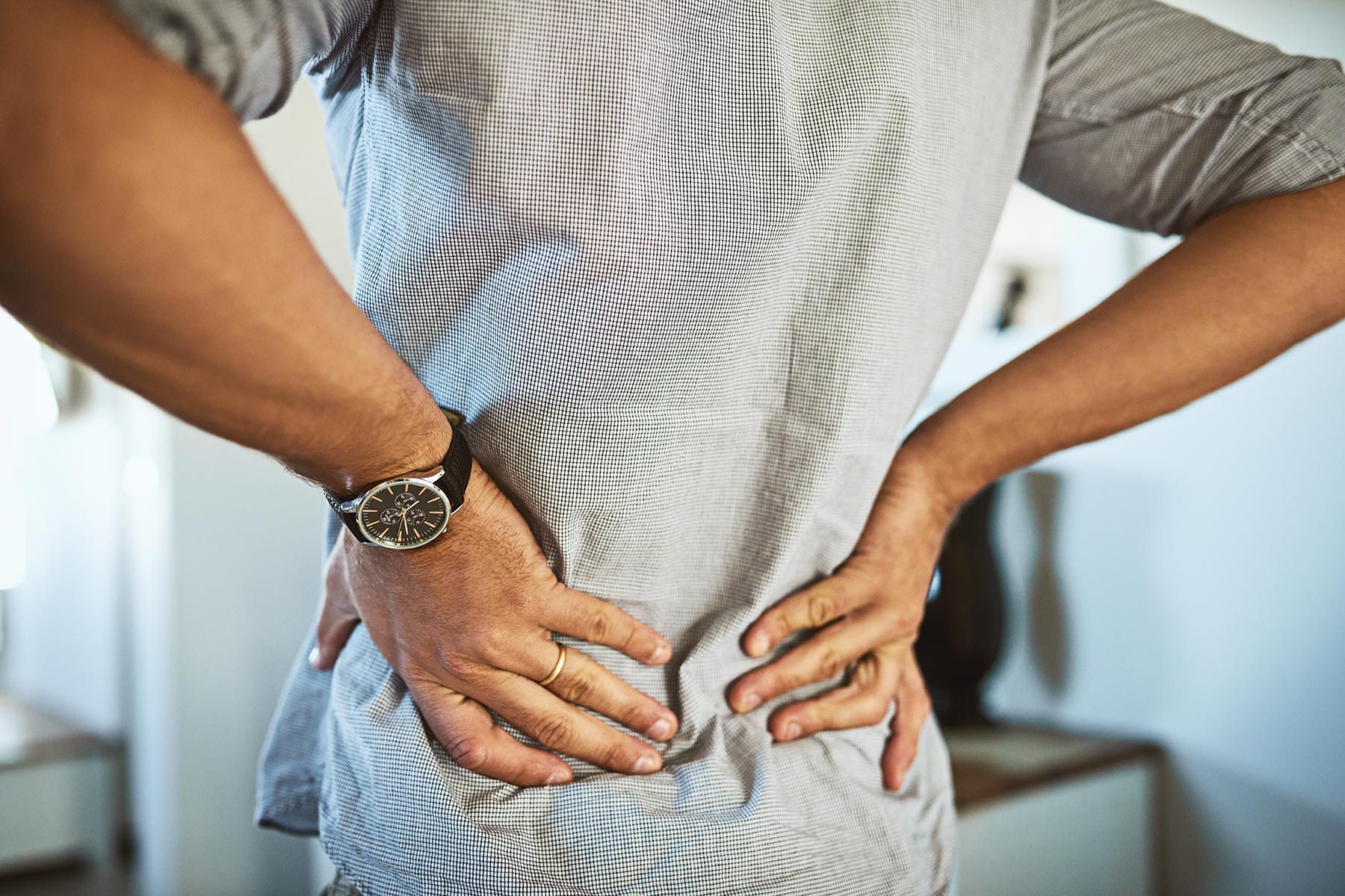 How to ease back pain at home fast