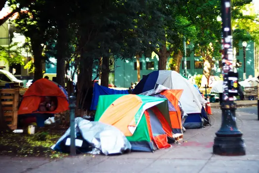 photo of tent city in urban setting
