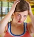 young woman with migraine