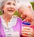 two senior women laughing