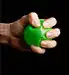 hand gripping green rubber ball