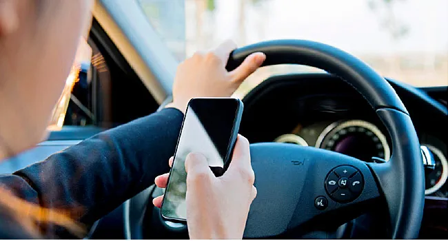 distracted driver using smart phone