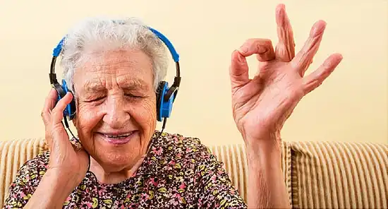 old woman listening to music