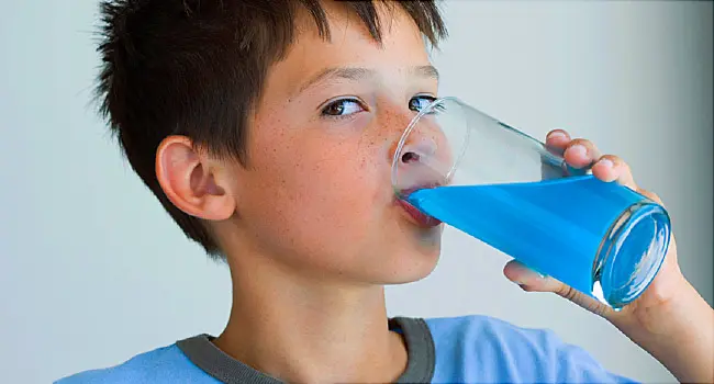 kid drinking blue drink