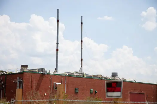 photo of towers on factory