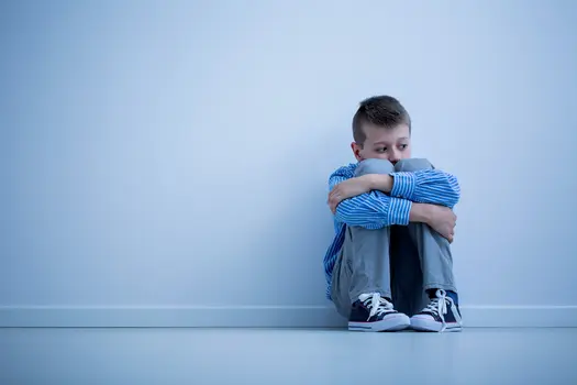 photo of boy with depression