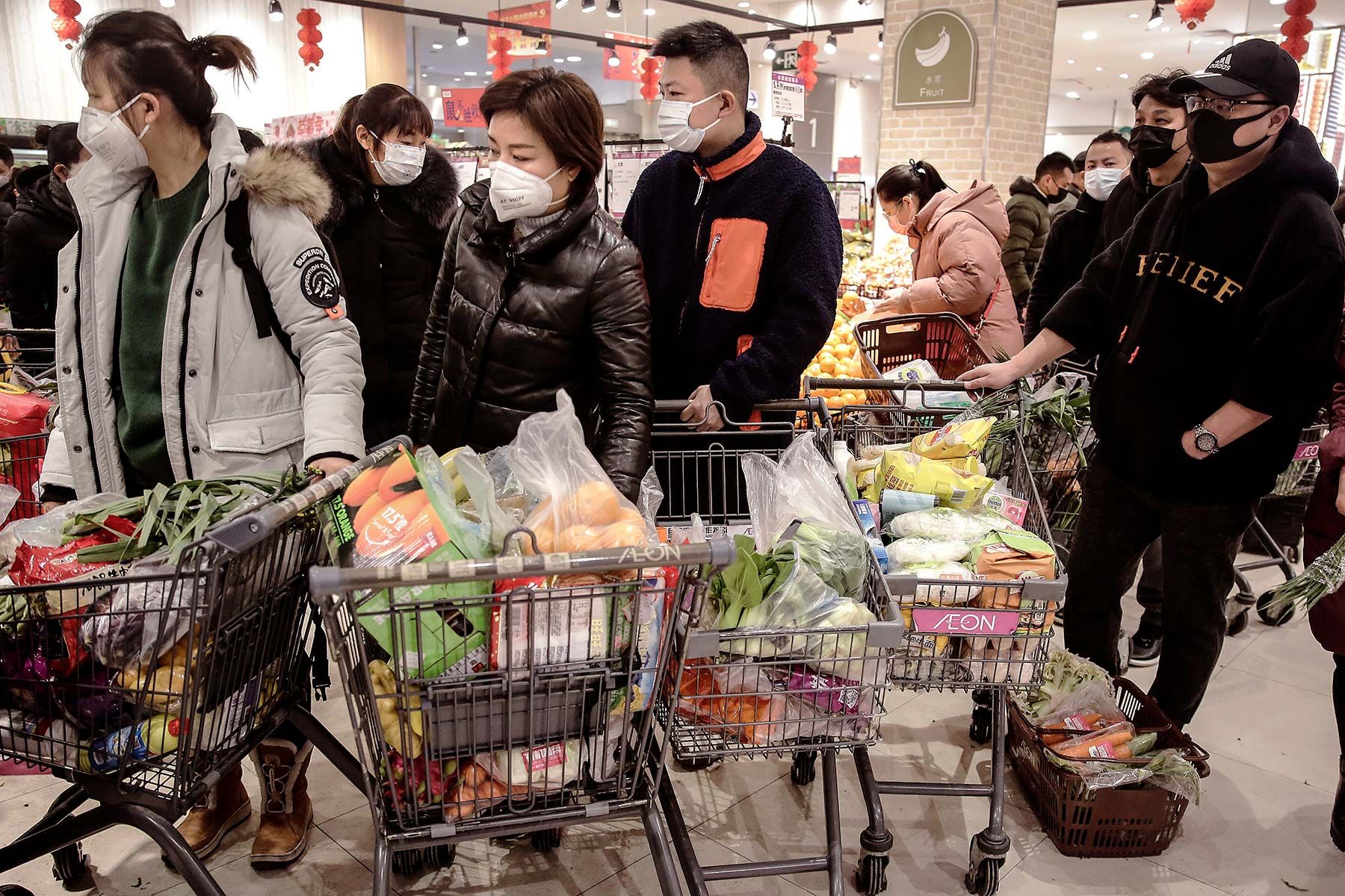 photo of chinese shoppers wearing masks