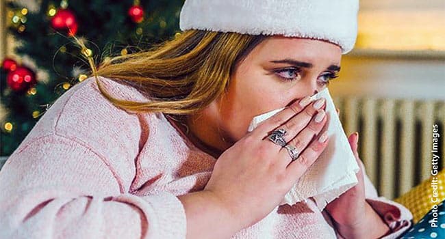 photo of woman with cold during Christmas season
