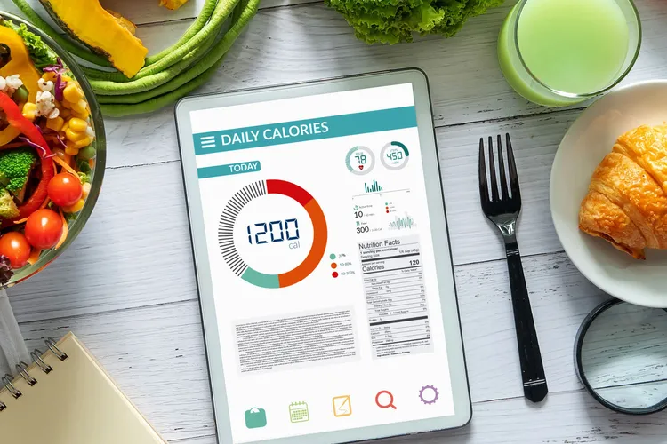 photo of counting calories with tablet