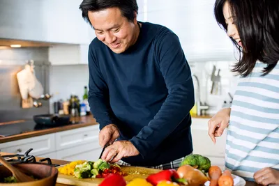 couple cooking healthy meal