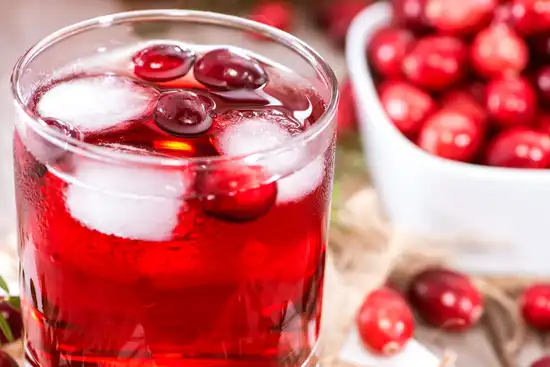 photo of glass of cranberry juice