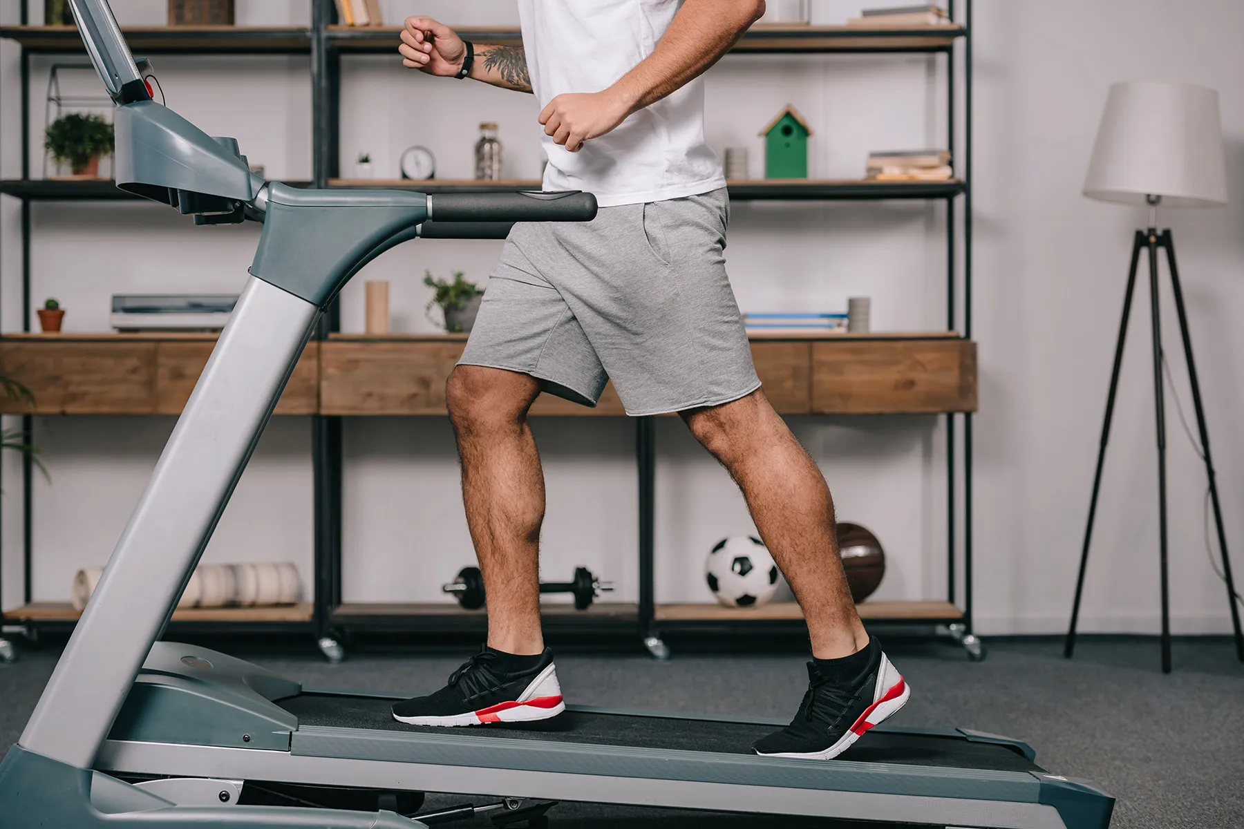 photo of man running on treadmill