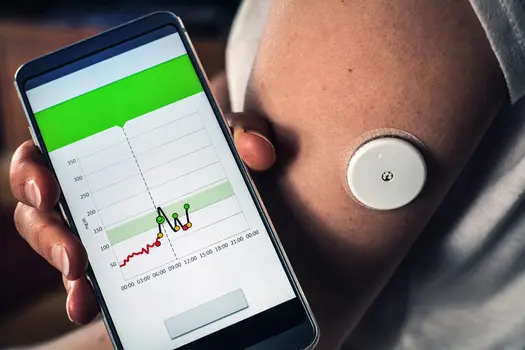 photo of smartphone synced to glucometer