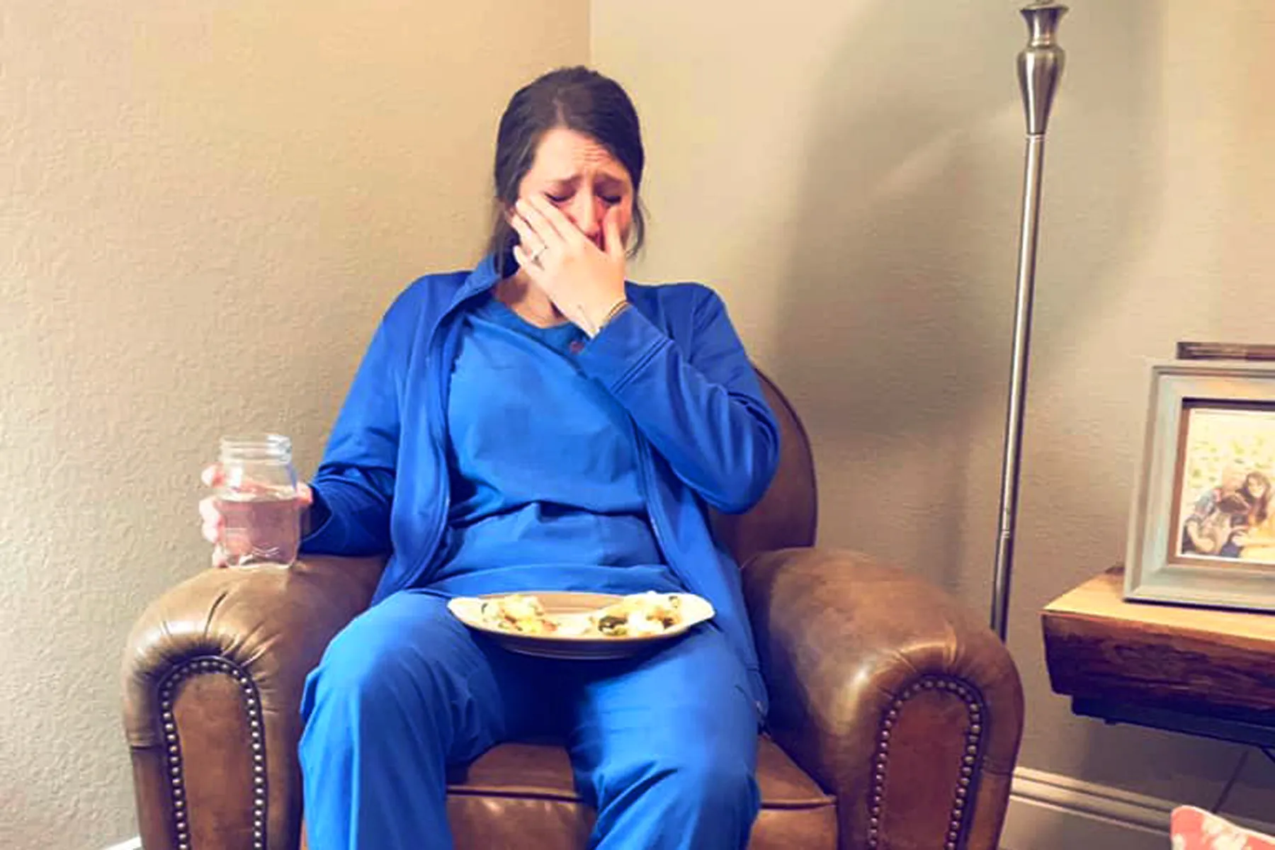 photo of nurse crying over dinner